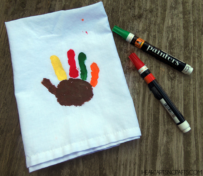 Easy Handprint Cloth Napkin - Make adorable handprint turkeys for Thanksgiving!