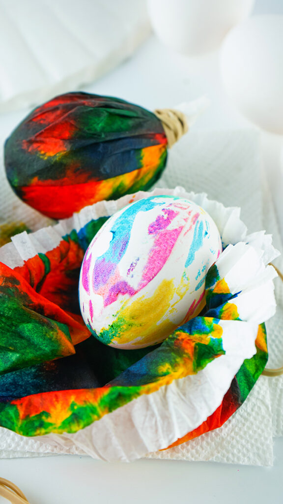 Learn how to make Tie Dye Easter eggs with coffee filters. It's so easy and this technique makes the most colorful Easter eggs!
